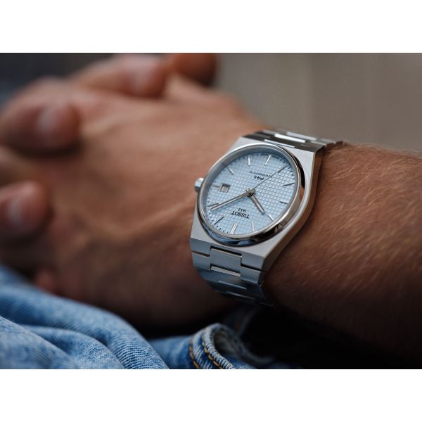 https://cdn.jewelryimages.net/jewelsmiths/images/items/JPG-Tis-ADV-PRX-Auto_IceBlue_T1374071135100_Lifestyle.jpg?v=17